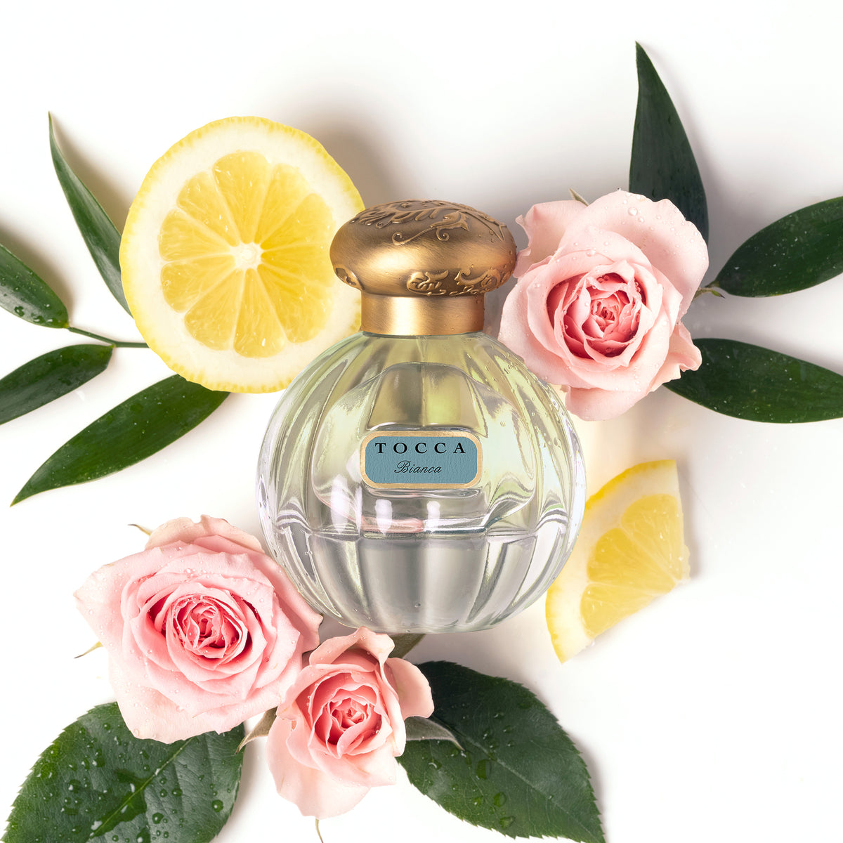 Florence Eau de Parfum bottle with flower and lemon