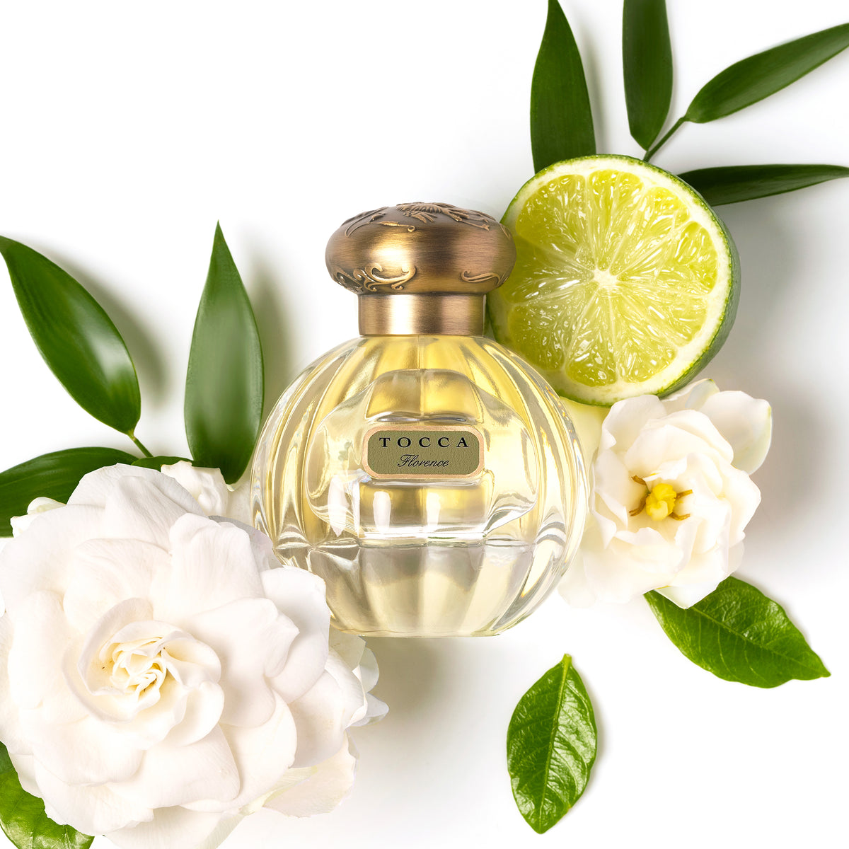 Florence Eau de Parfum bottle with flower and lime
