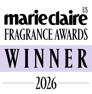 Award badge reading 'marieclaire US FRAGRANCE AWARDS WINNER 2026' with black text on white and a light lavender horizontal band behind the word WINNER.