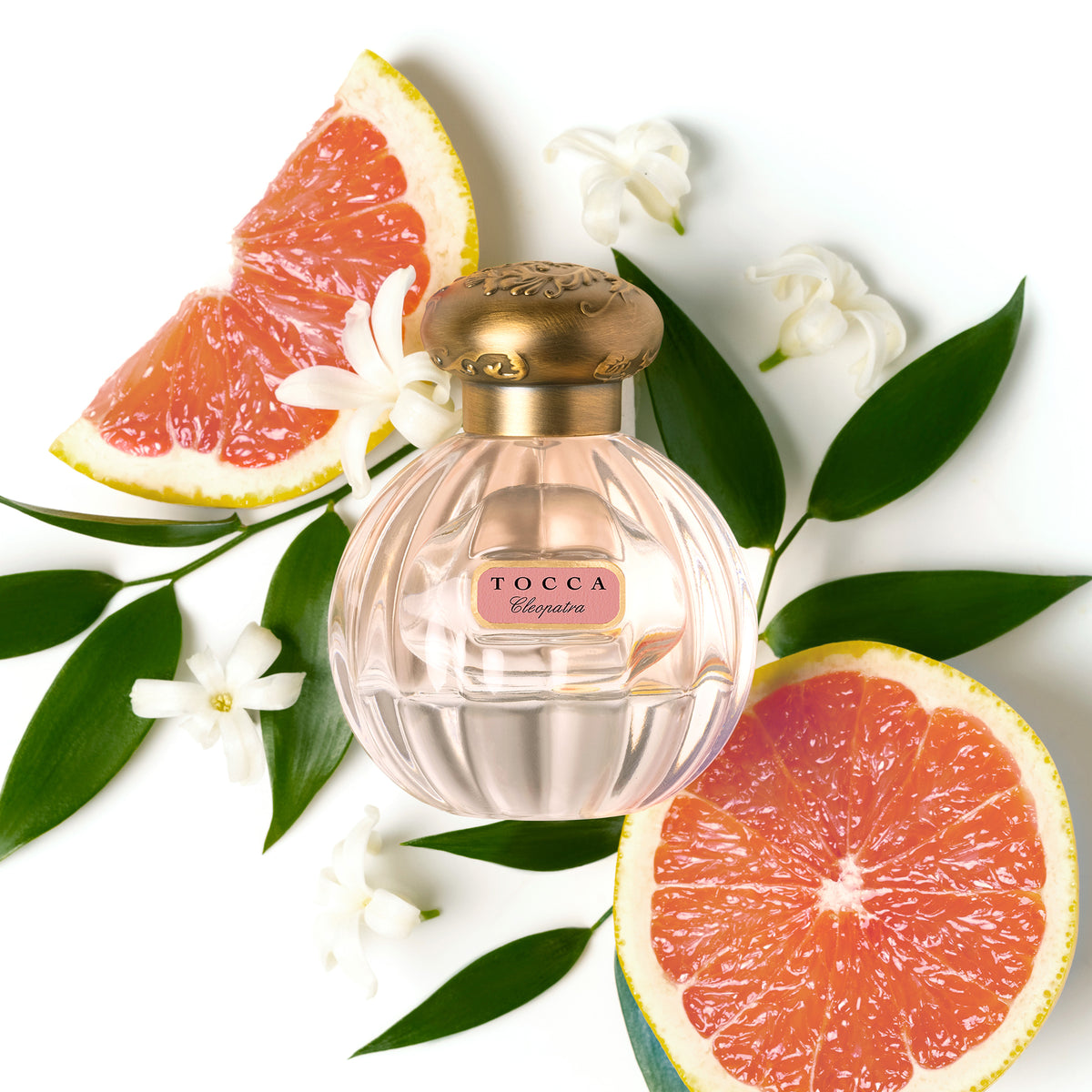 Florence Eau de Parfum bottle with flower and grapefruit