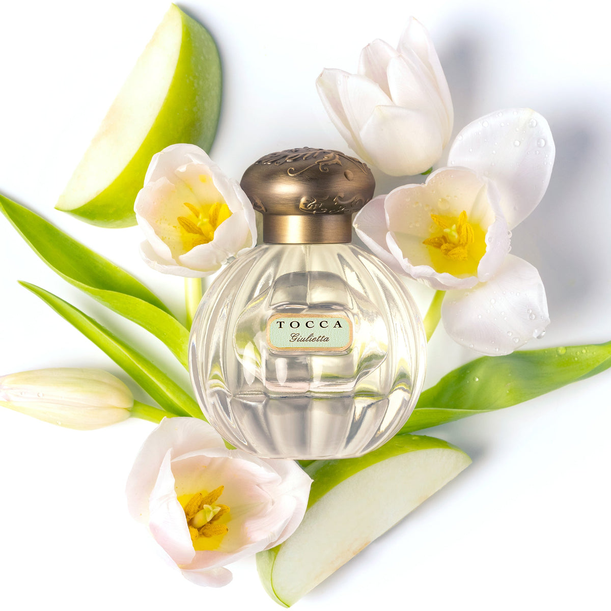 Giulietta Eau de Parfum bottle with flower and green apple